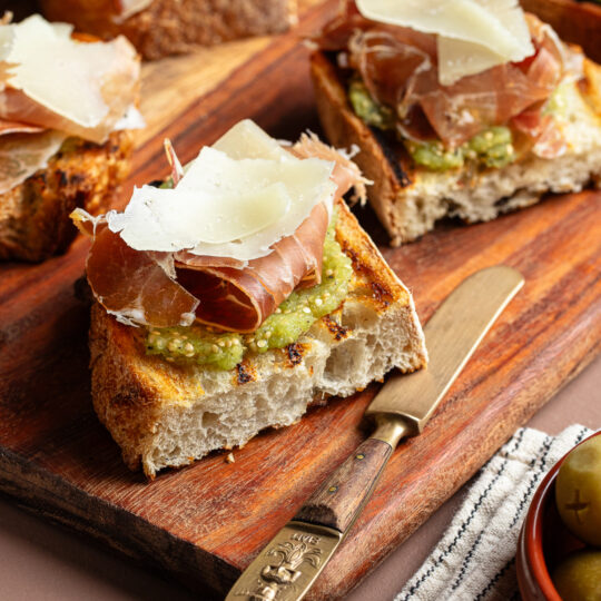Grilled Toast with Tomatillos, Jamón, and Manchego Gelson's