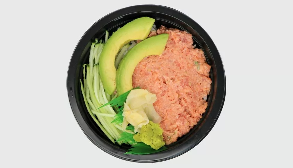 713 Spicy Tuna Bowl dev spicy tuna, sliced avocado, cucumber and picked ginger and wasabi with rice in a black bowl
