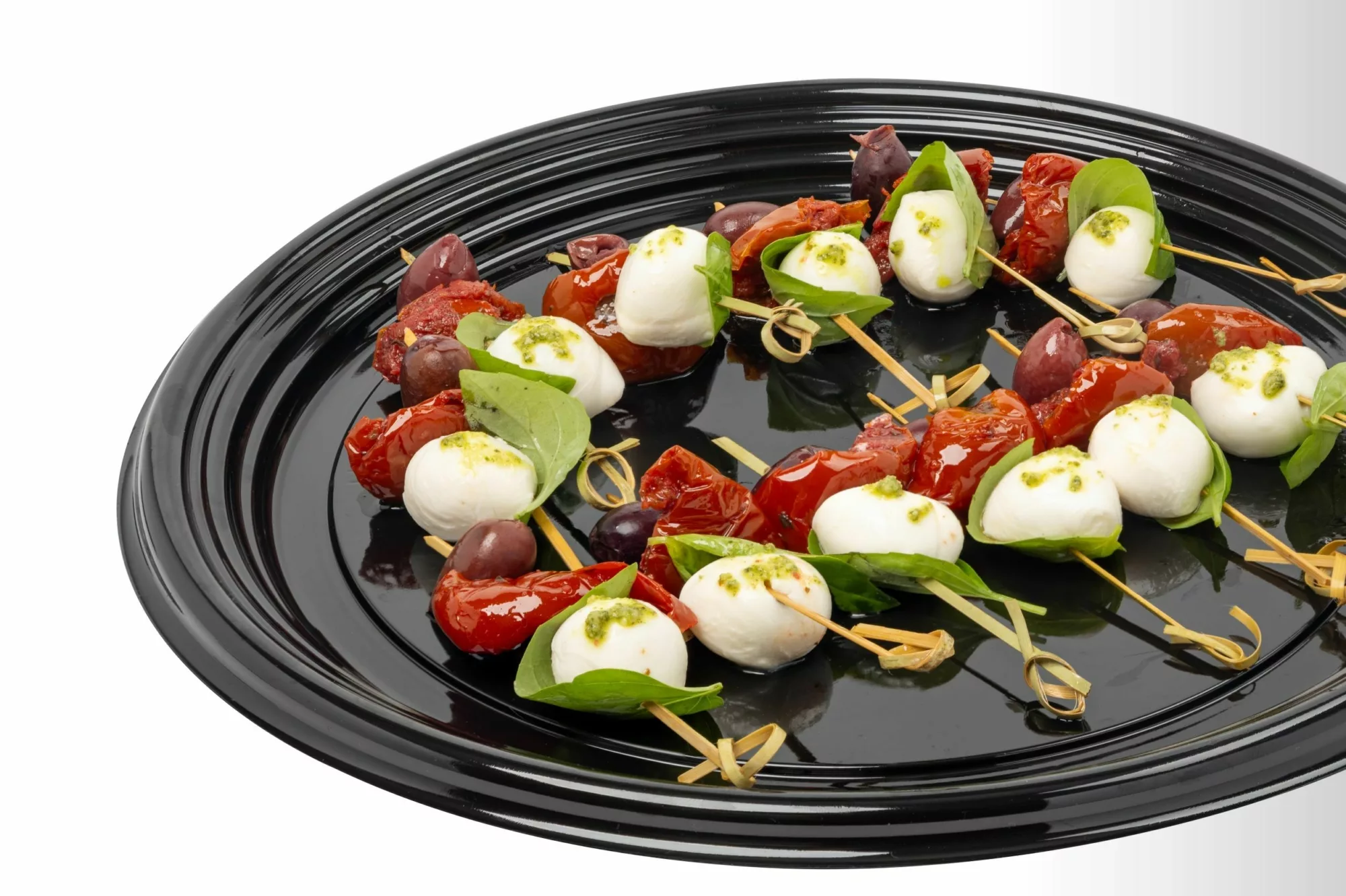 PLU 9039 Antipasto Brochette Cilingini mozzarella, roasted tomato, kalamata olive with a basil pesto drizzle. Includes 12 pieces.
